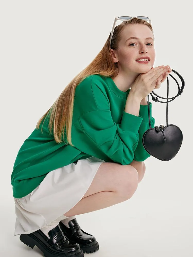 Faux Two-piece Sweatshirt Dress Paired With A Handbag